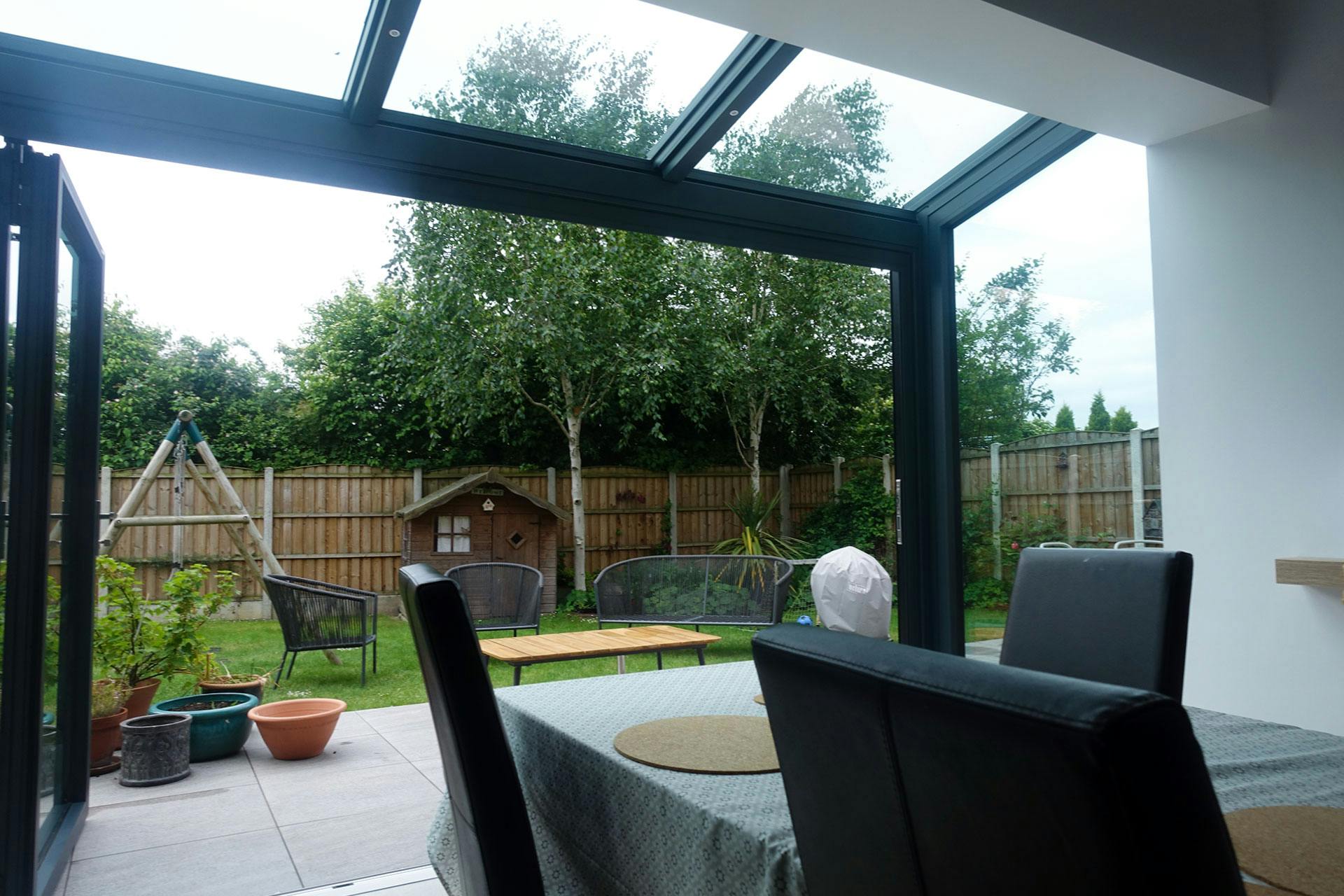 glass extension view across garden in Wakefield