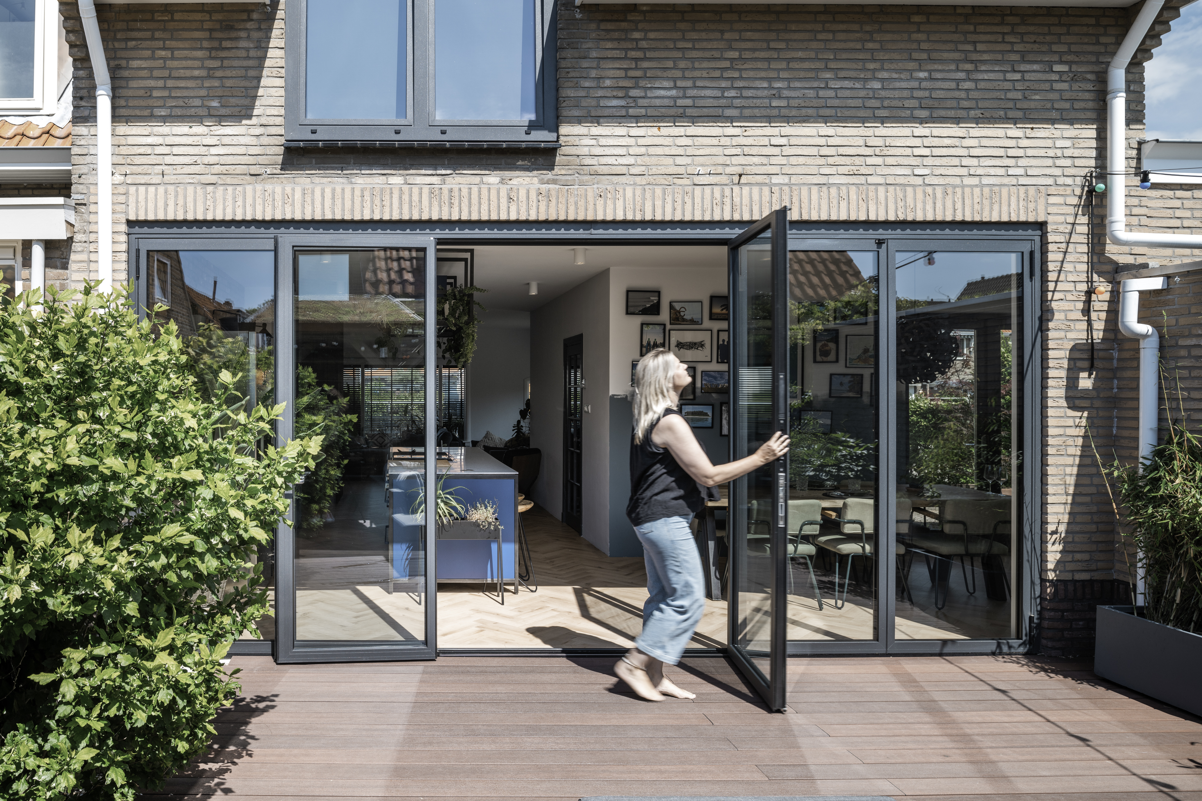 Ecoline bi-folding doors being opened