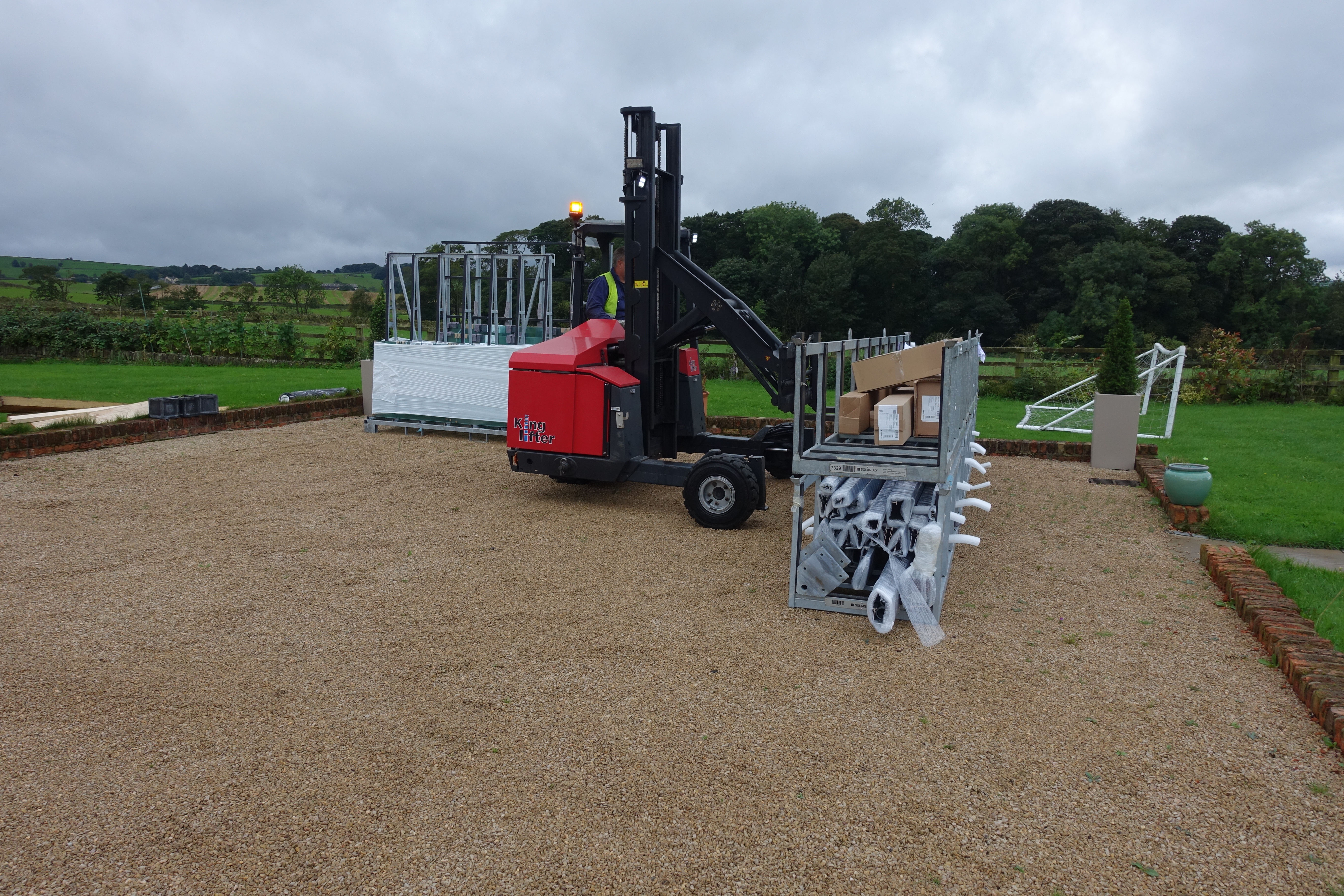 moffett forklift at glass room installation