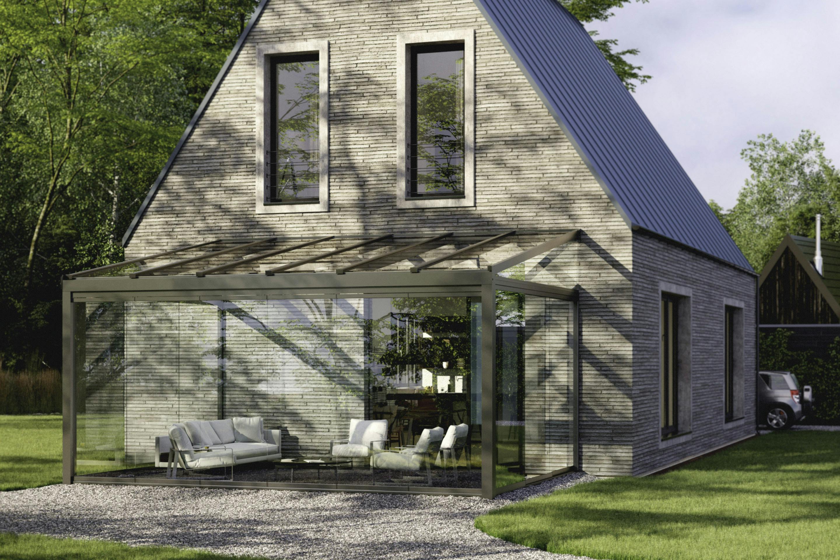 Brick house with modern glass room attached to rear