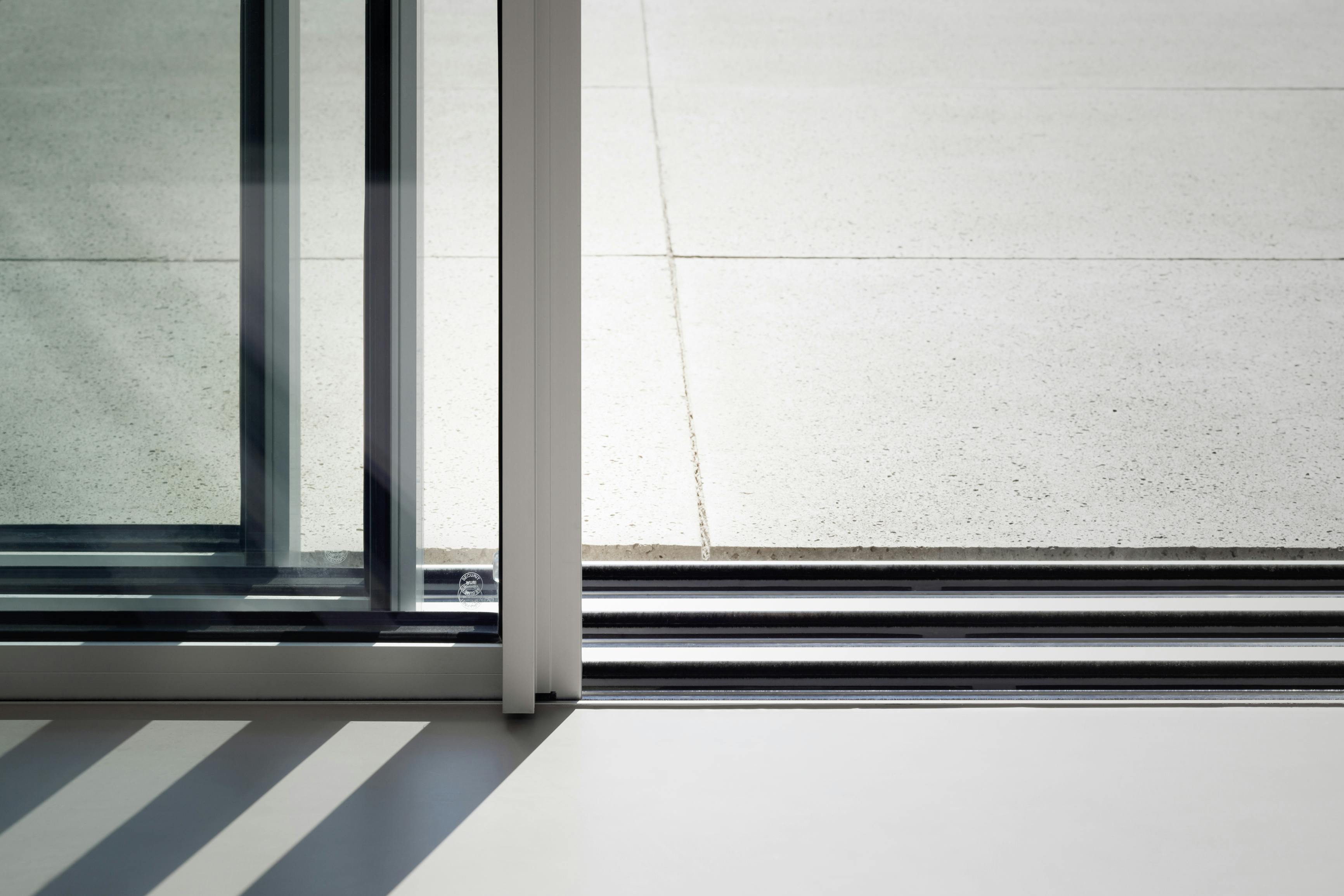 Sliding glass doors lined up behind each other