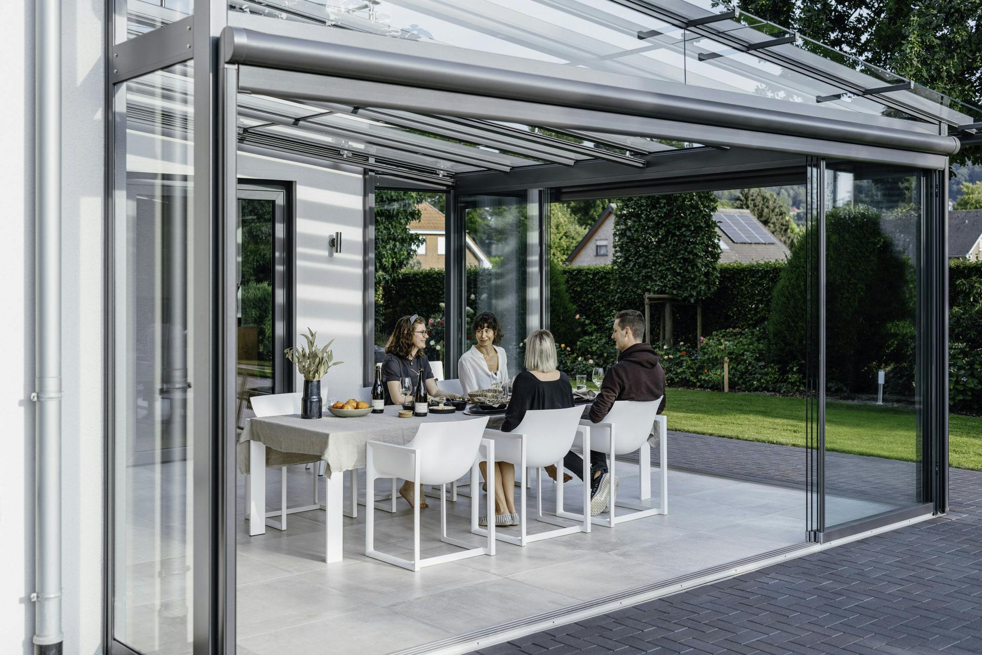 atrium plus with dining table and chairs inside