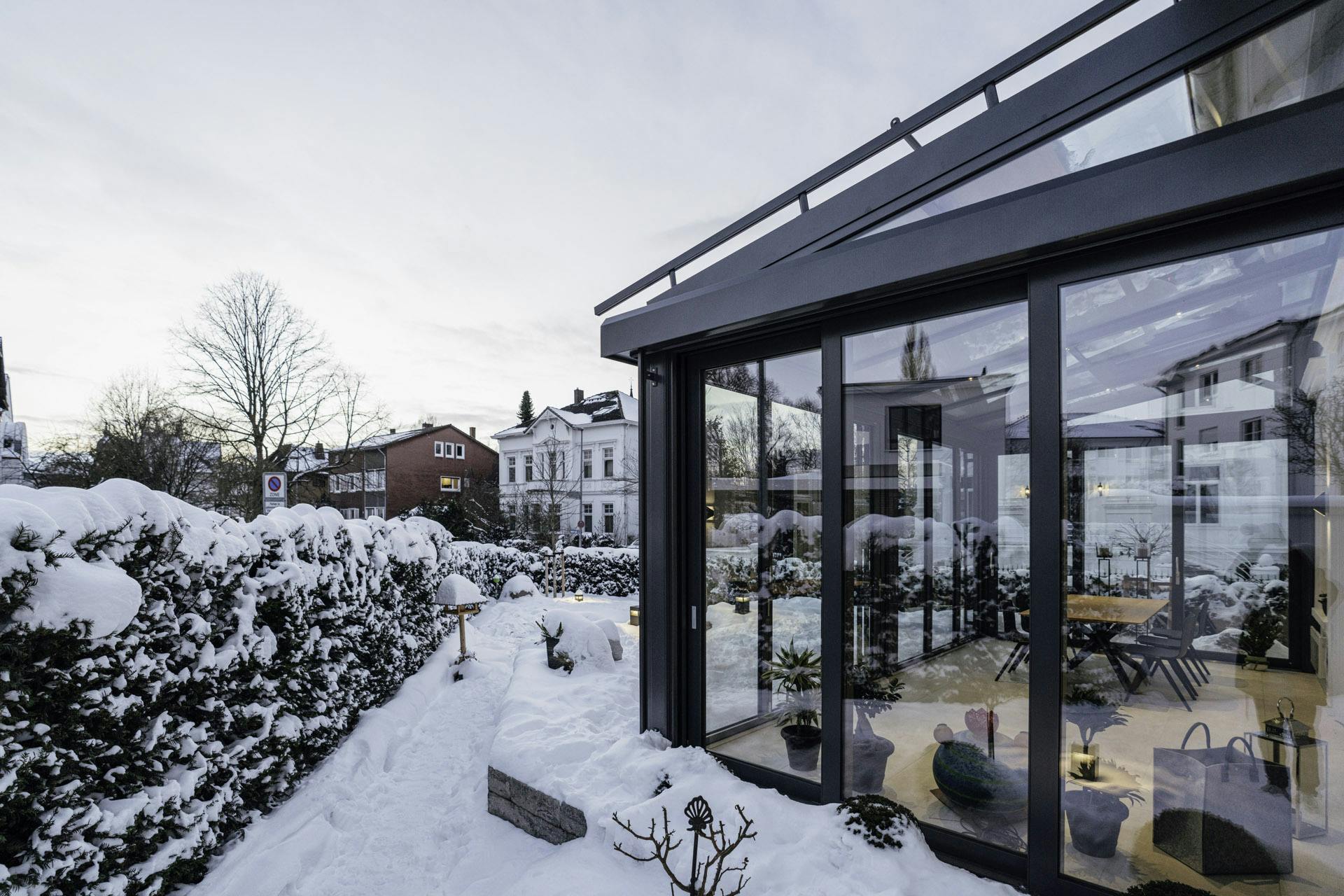 energy efficient conservatory in winter with snow