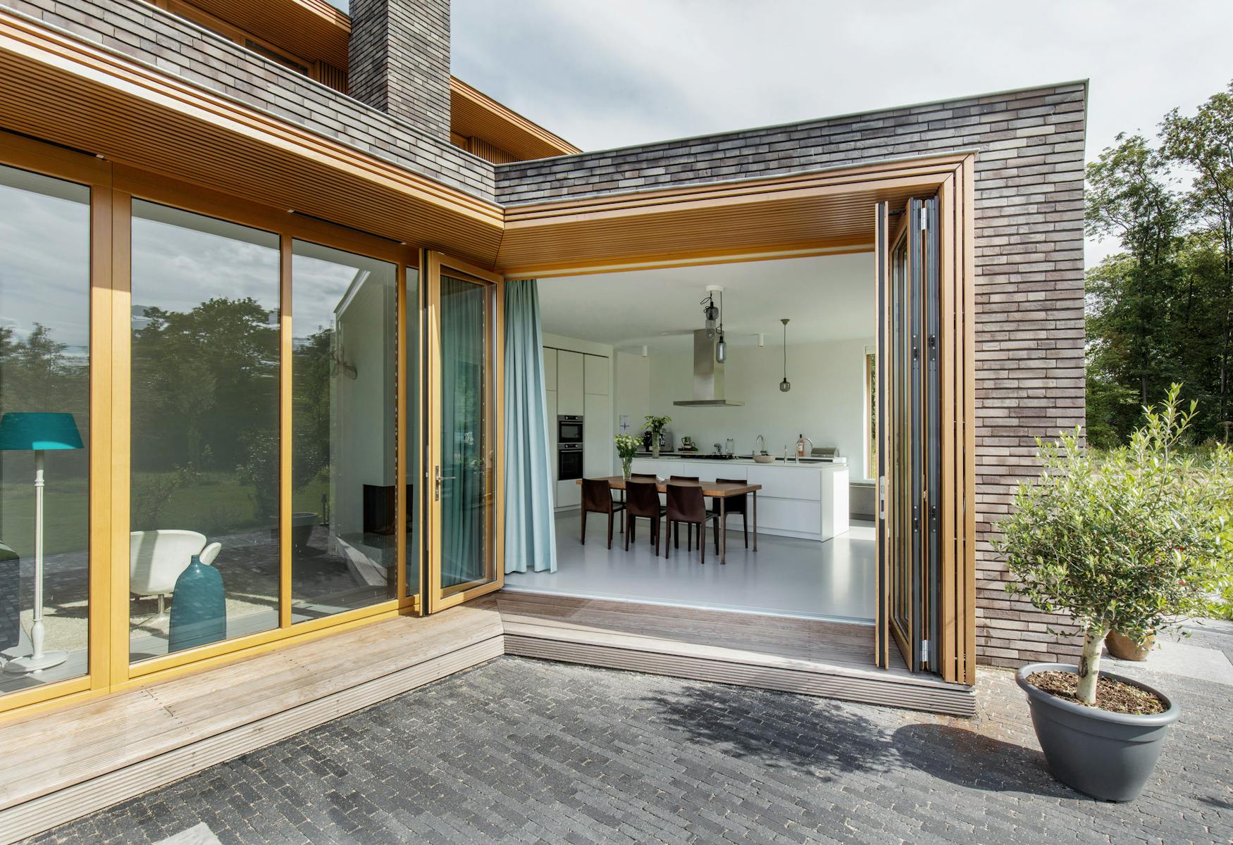 Luxury timber bi-fold doors from an external perspective