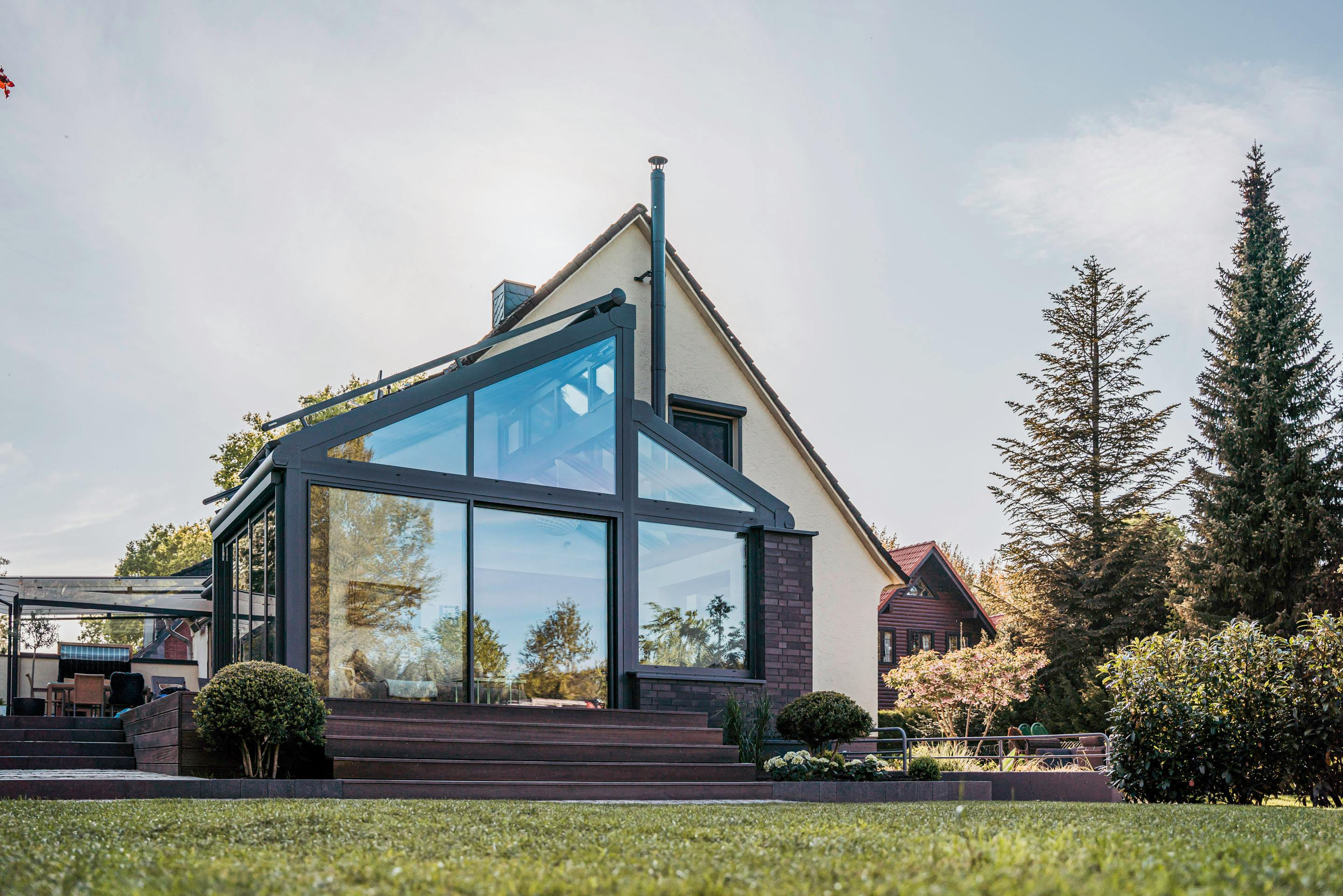 home office extension with pitched roof mirroring angle of house roof