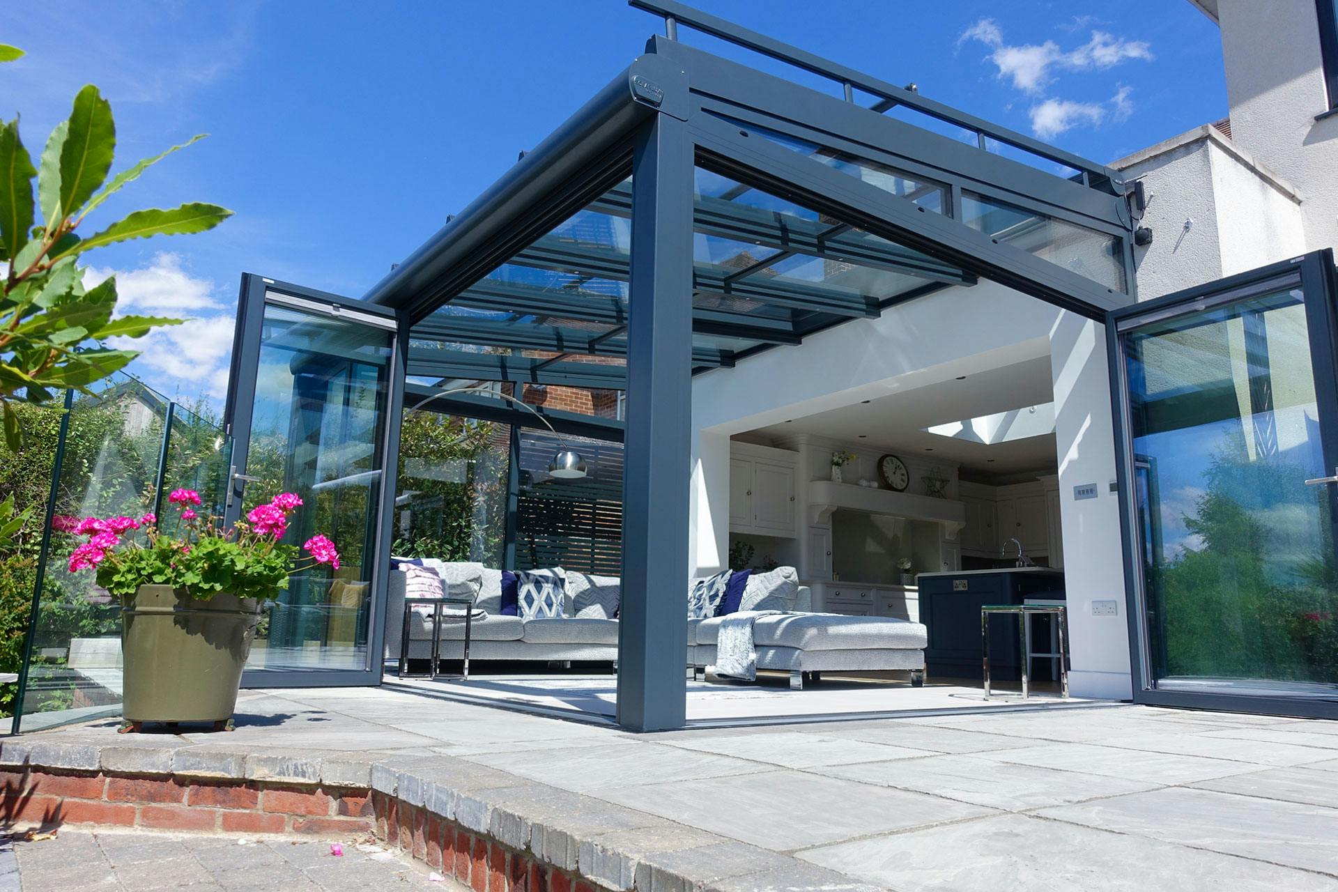 open corner glass doors on orangery extension