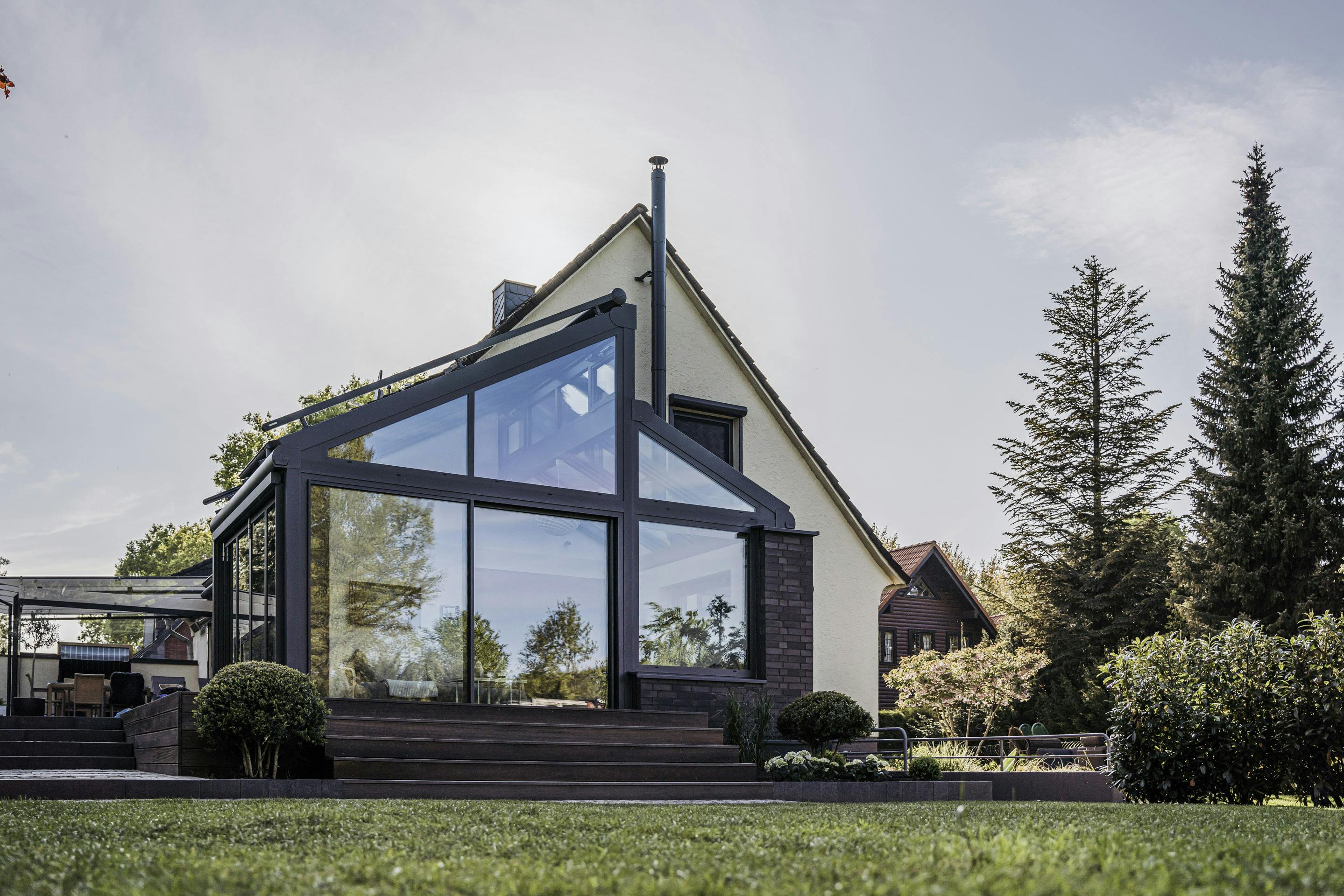 pitched roof orangery home extension on detached house