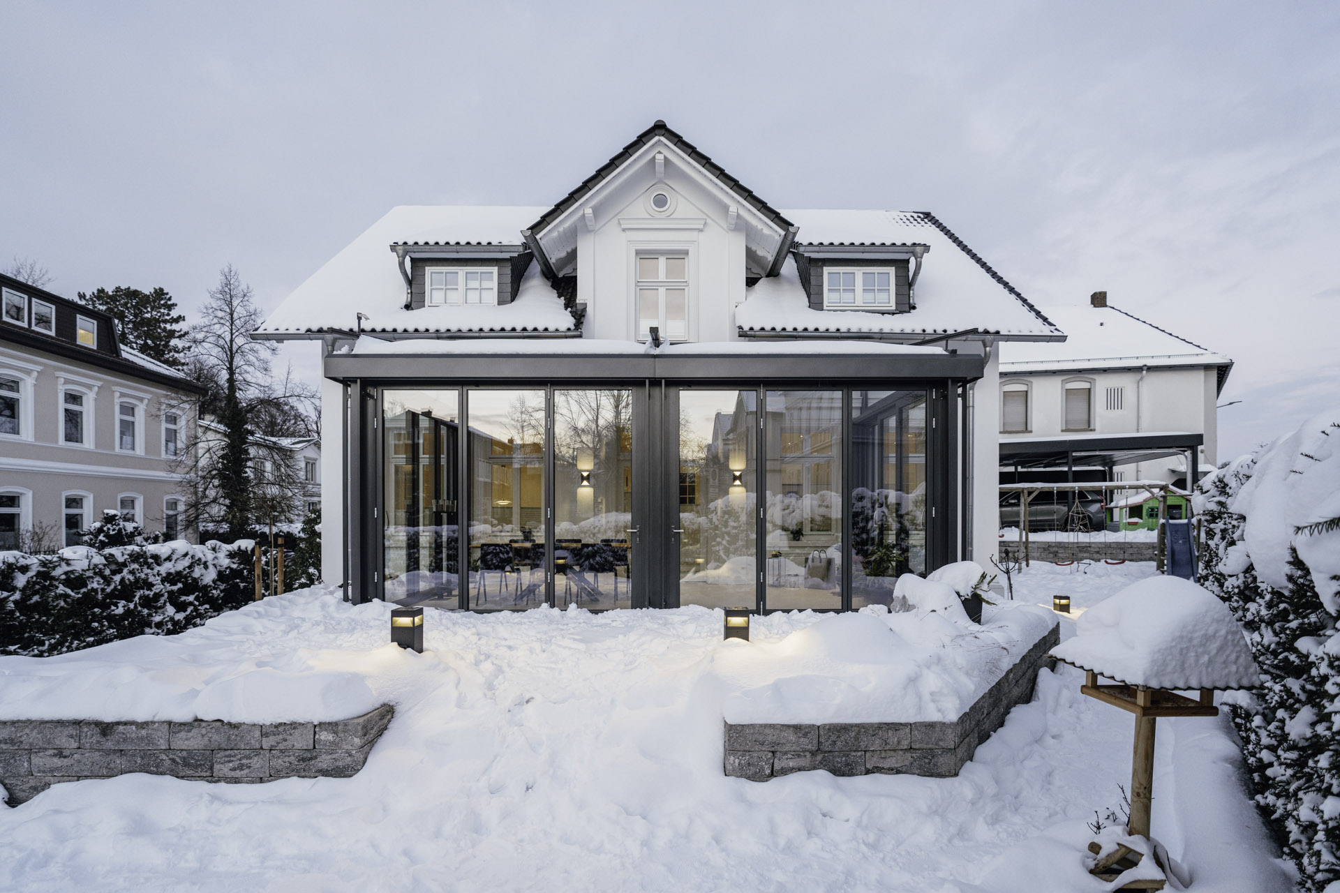 solarlux wintergarden glass extension in deep snow