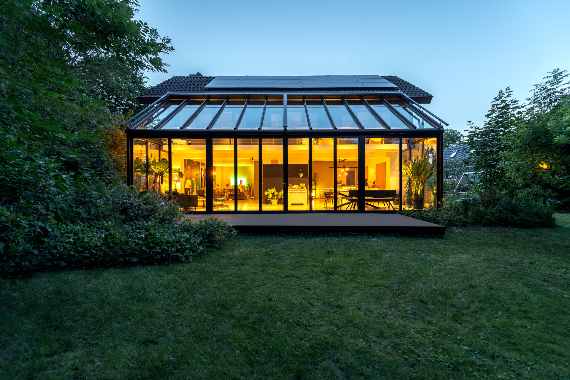 Closed alu-clad doors with soft lighting internally