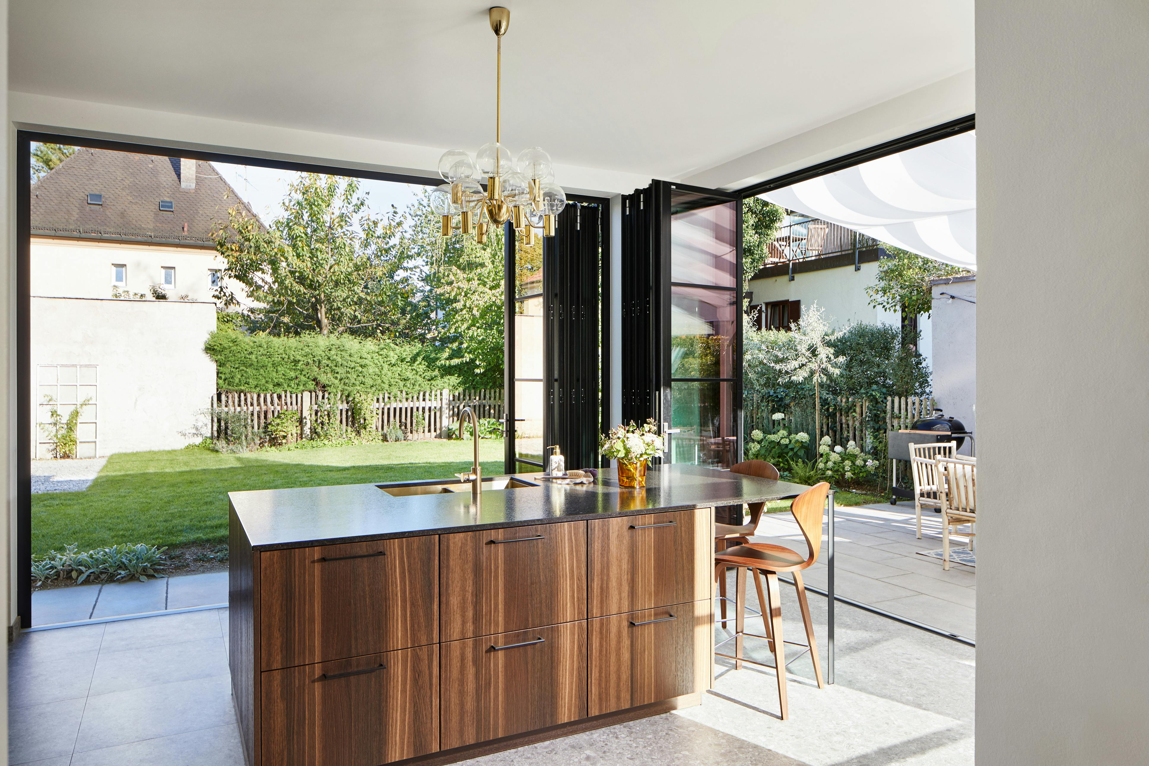 Bi-folding doors stacked to the side