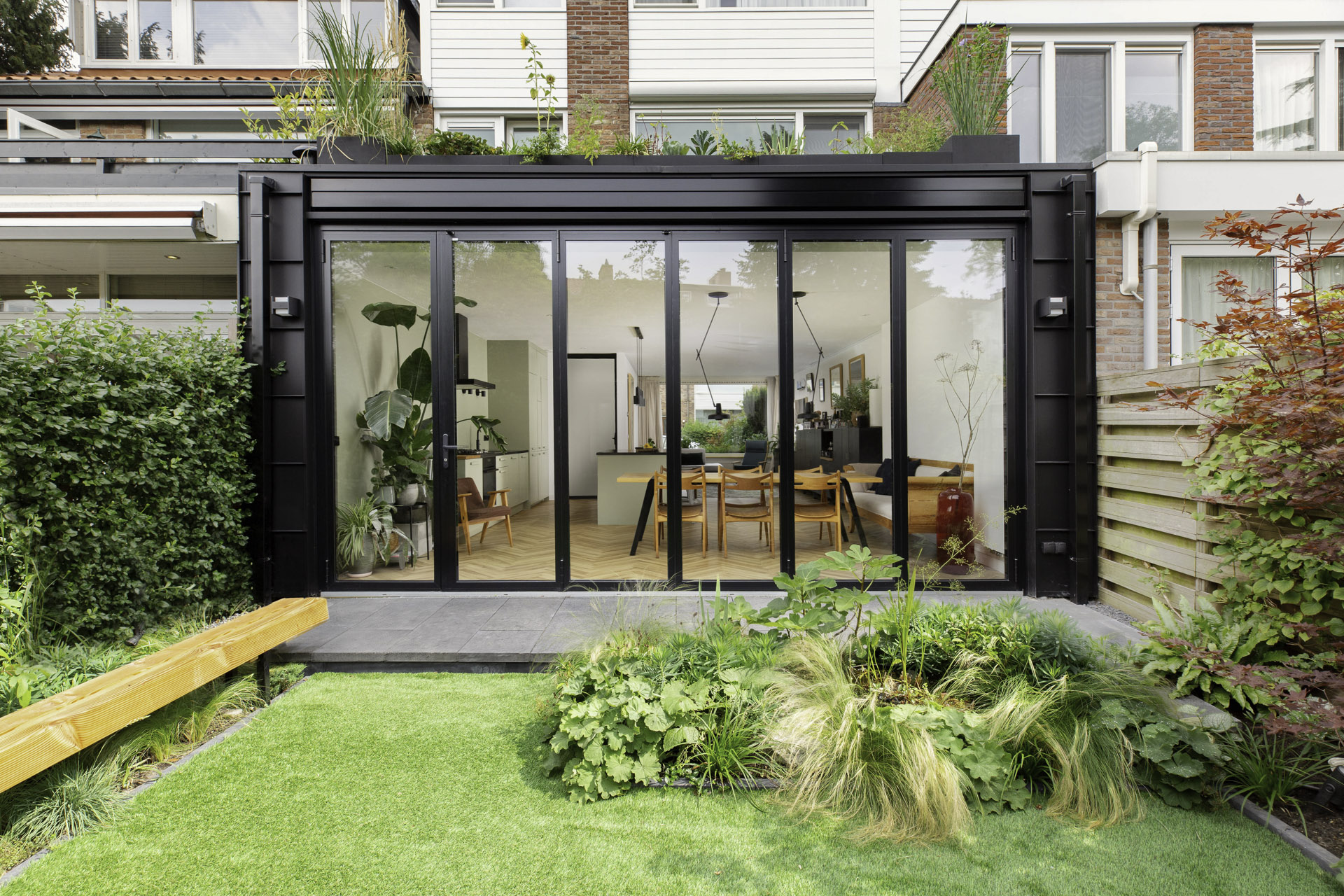 Closed Megaline bi-fold doors viewed from the rear garden