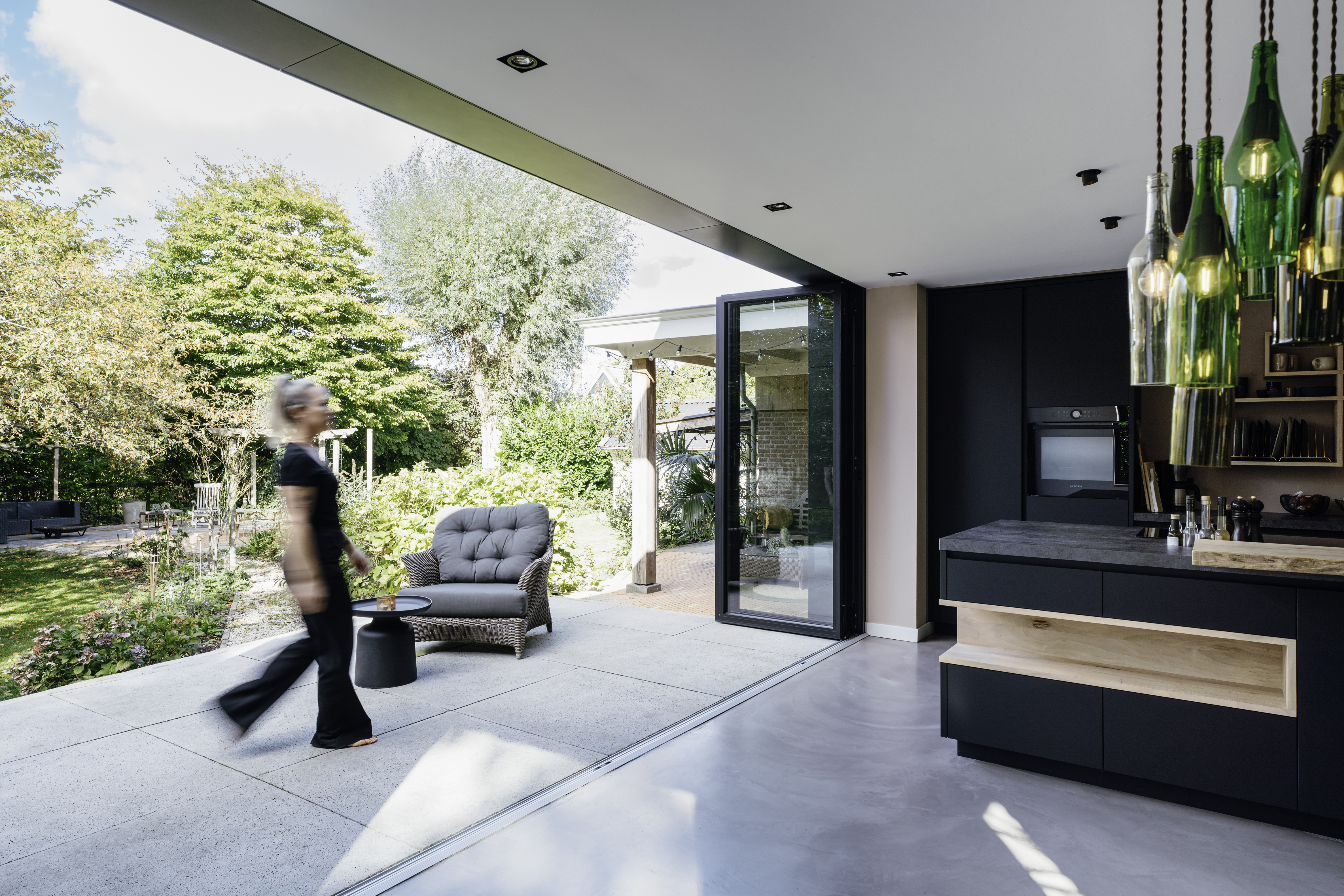 Open bi-fold doors leading to an outdoor space