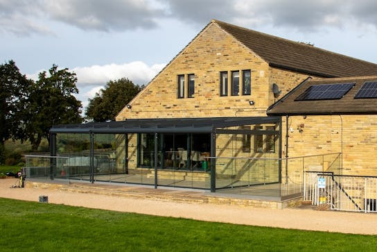 a large glass room in Yorkshire designed to have high wind resistance