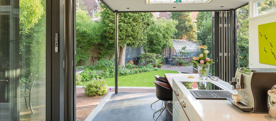 secure sliding and bi-folding glass doors in modern kitchen