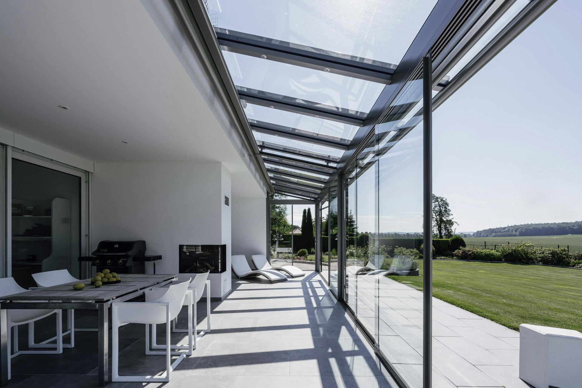 glass room extension at rear of detached home