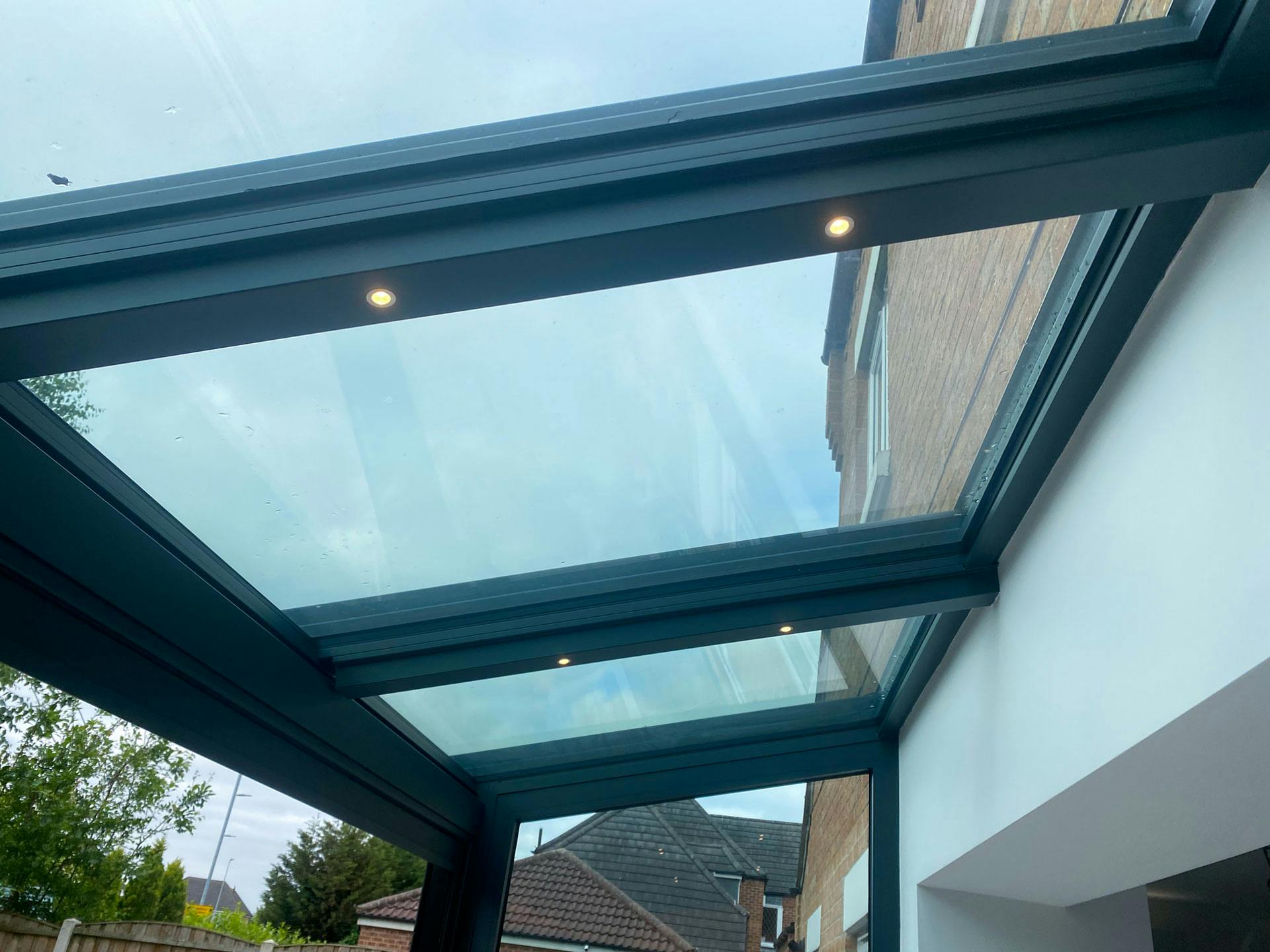 aluminium rafters of glass home extension