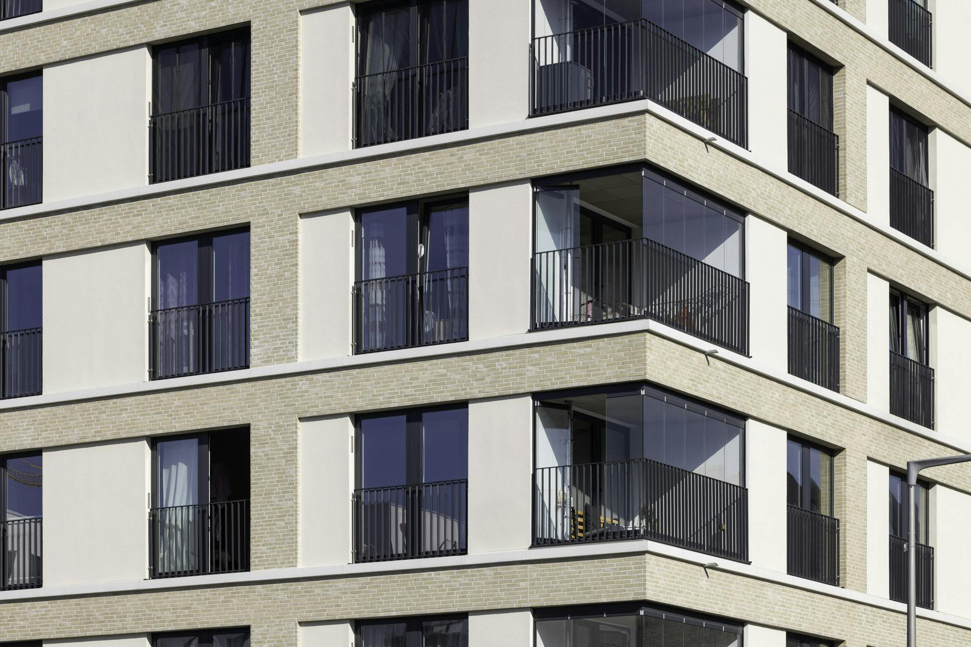 glass doors on balconies in high rise tower block