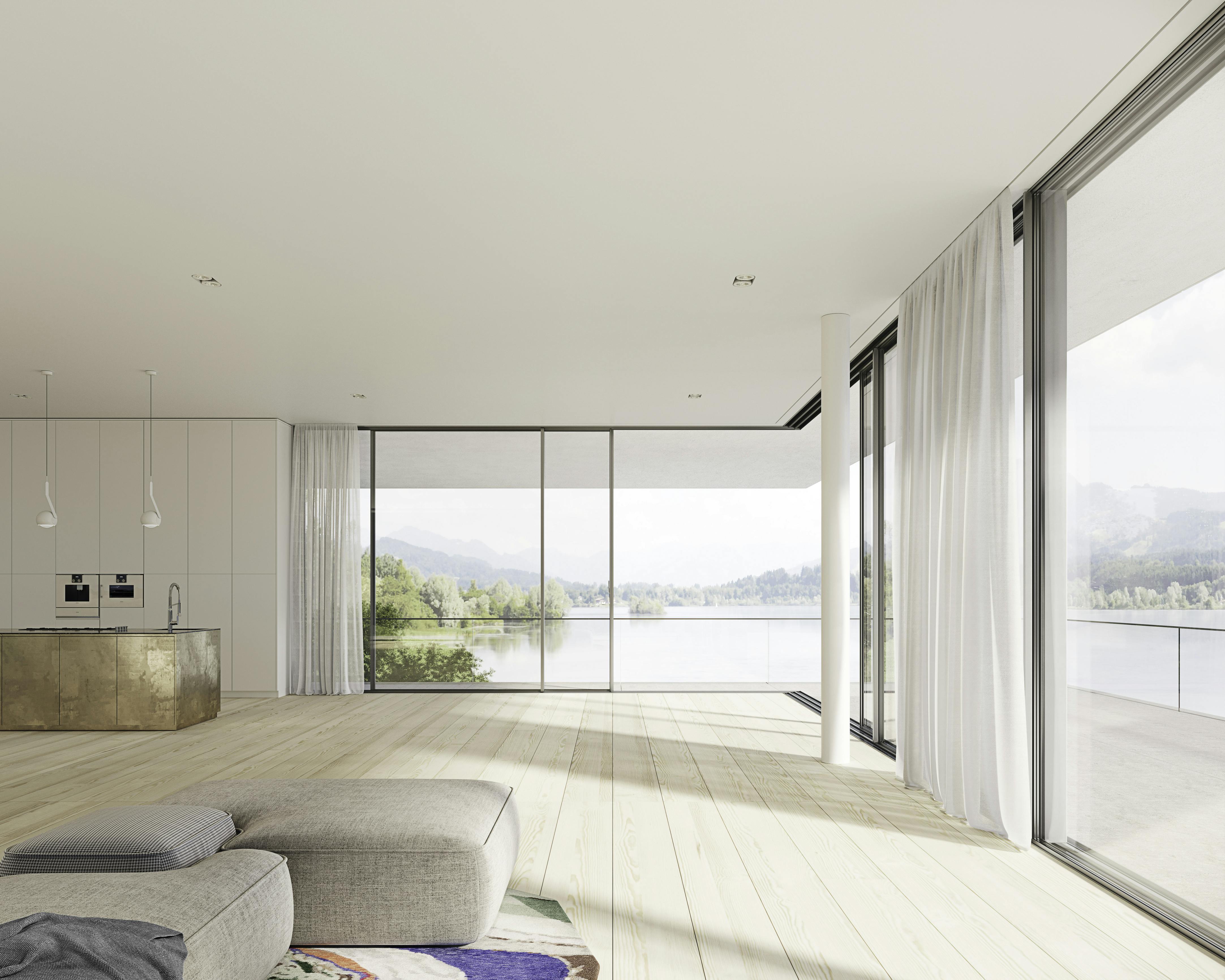 white living room with views of lake