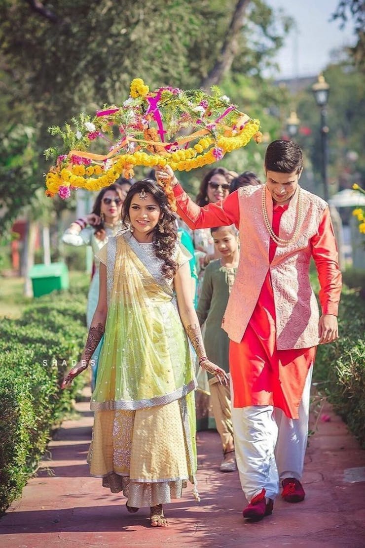 Bridal Entry With Floral Umbrella