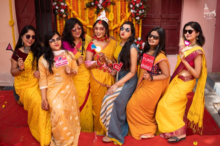 haldi poses with bridesmaids