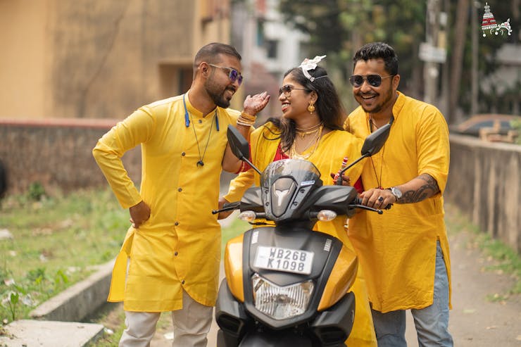 family poses for haldi function