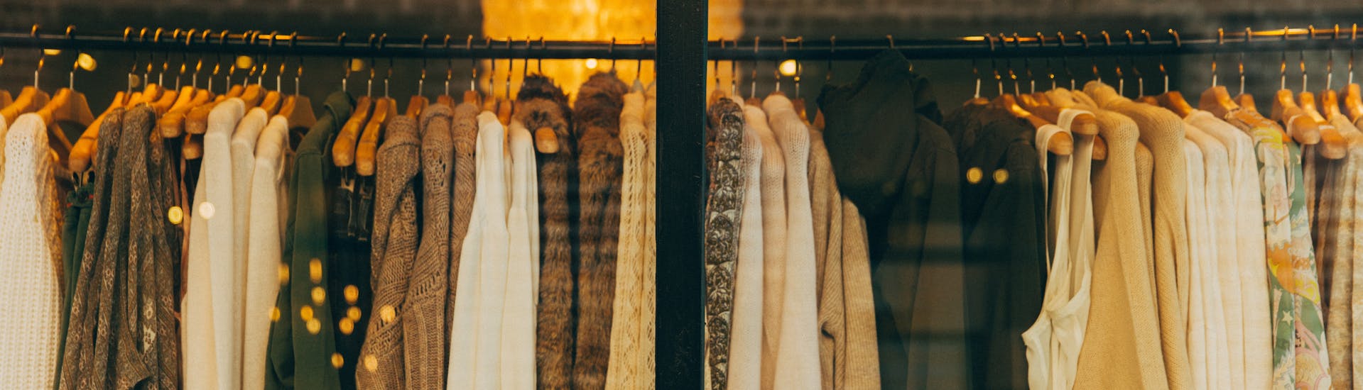 a rack of clothes from a fashion company on the stock market