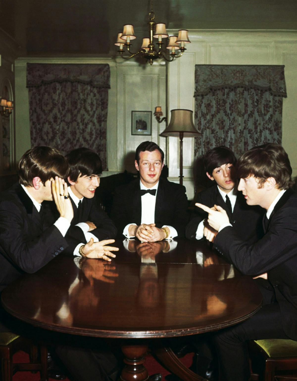 The Beatles with their manager Brian Epstein, 1963.