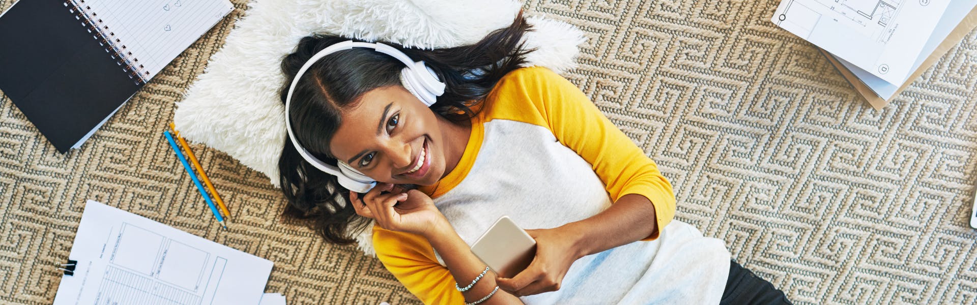 woman studying spanish with music