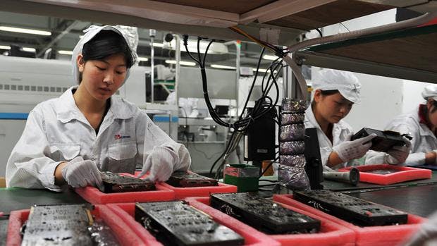 People manufacturing iPhones in China