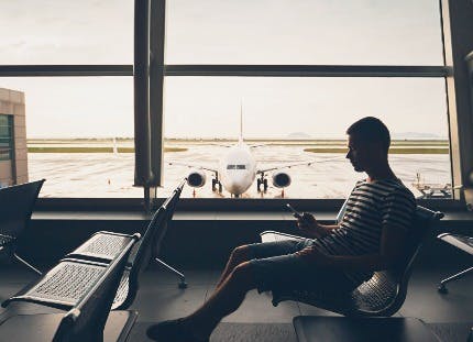 Man in airport lounge