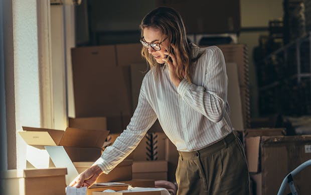 Business lady using mobile phone