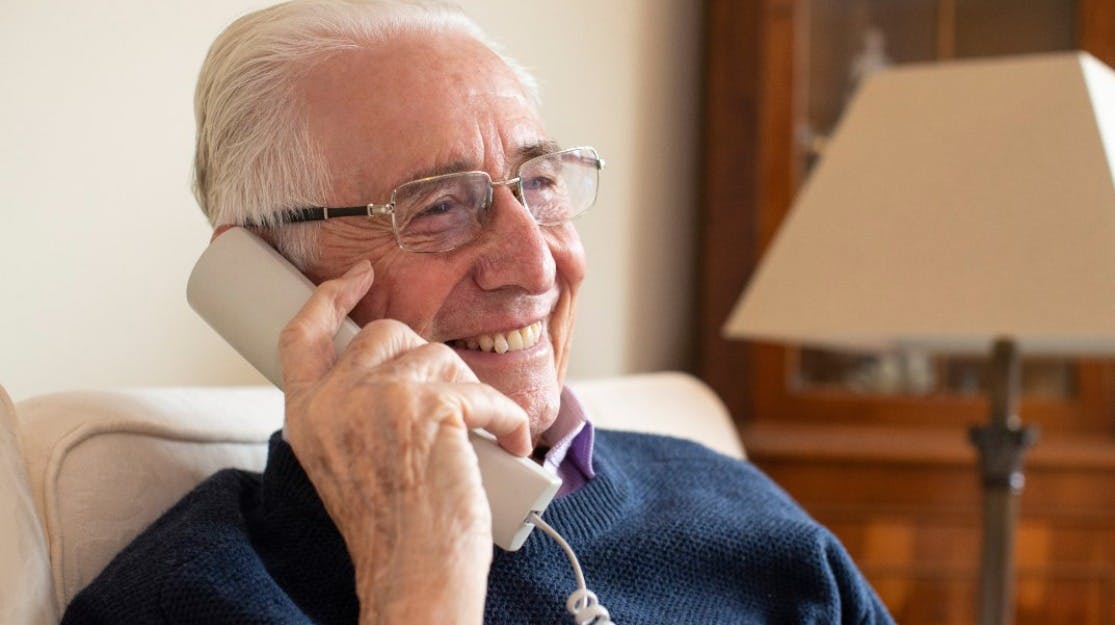 Elderly man on phone