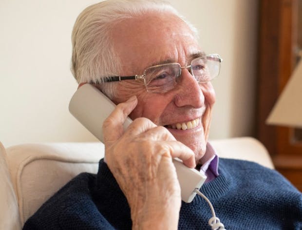Elderly man on phone