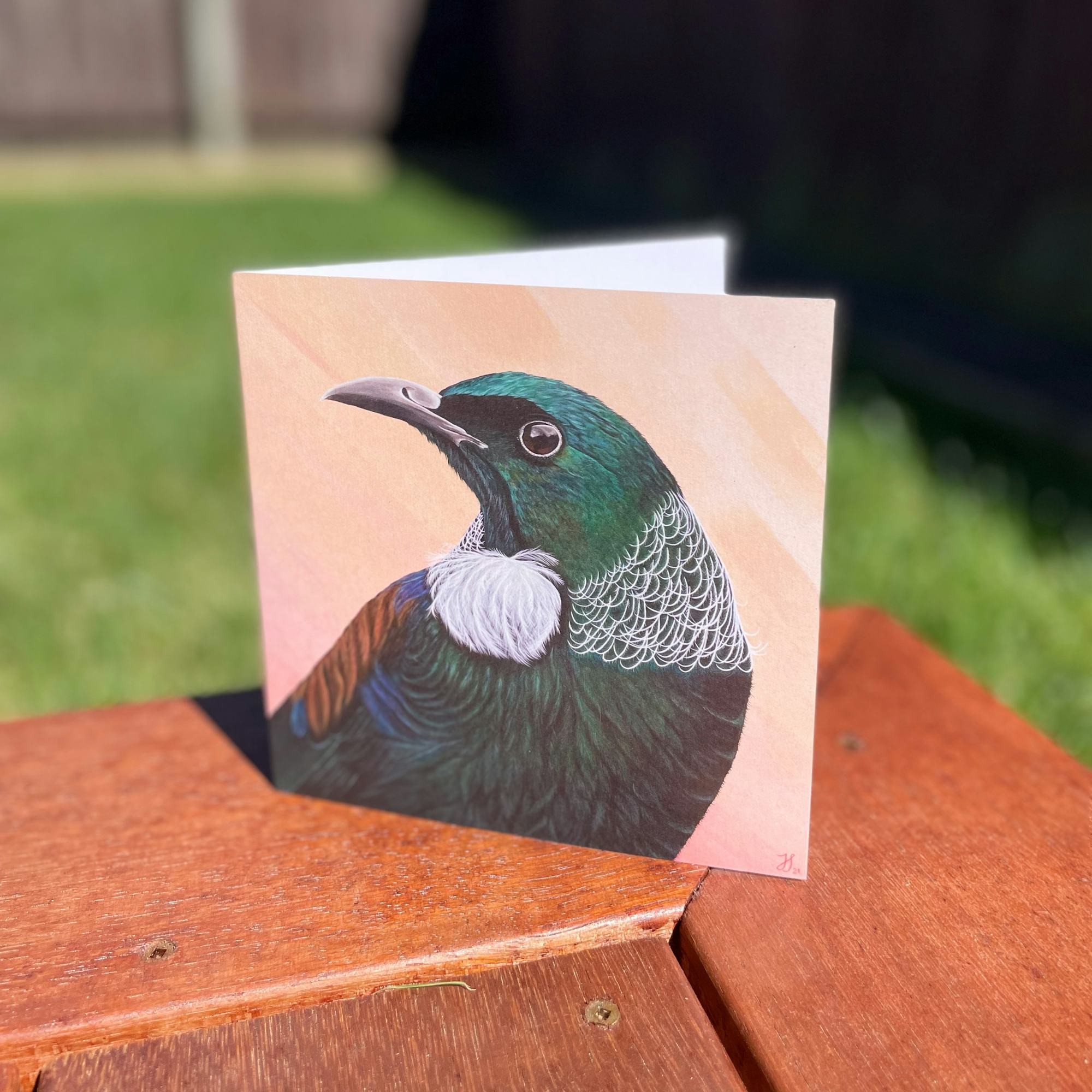 Square greeting card of a tui.