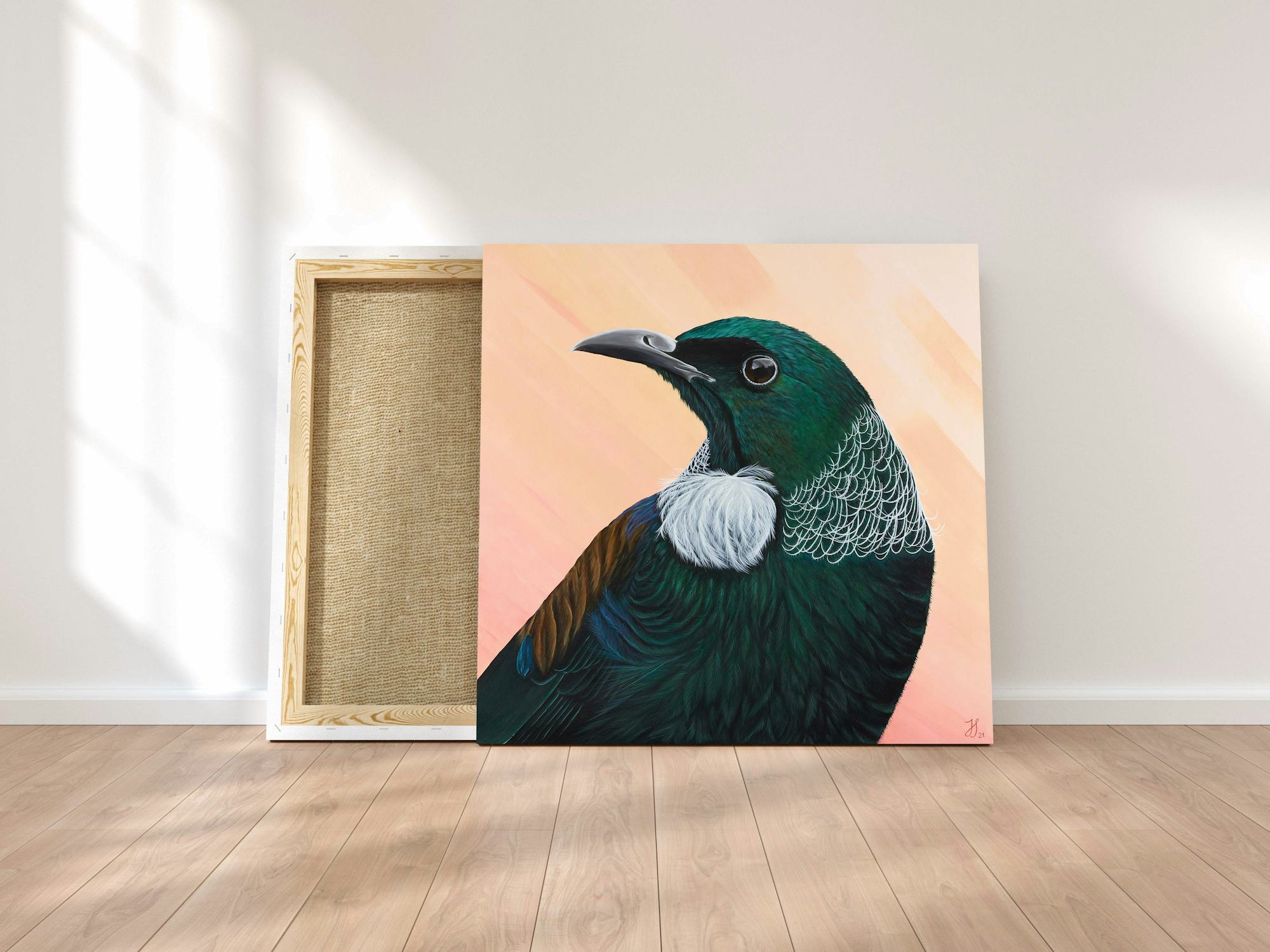 Original painting of a stunning NZ native Tui bird on a canvas that's leaned against the wall.