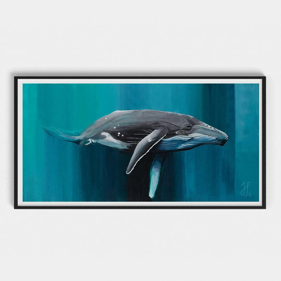 Framed painting of a whale painting floating through an abstract water background.