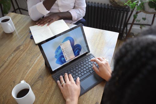 Picture of a person using a computer.