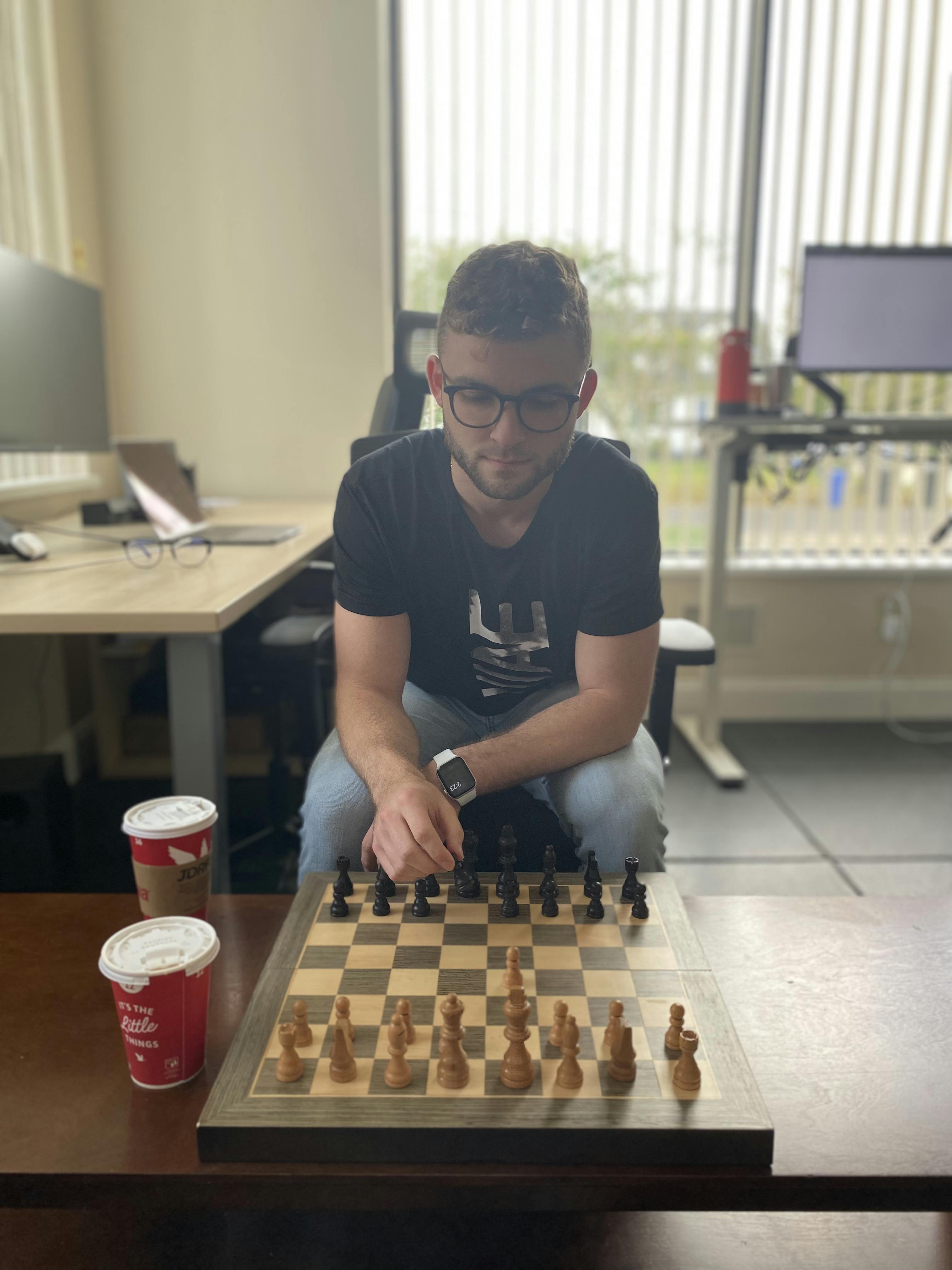 Picture of Anthony playing against Kenny in chess
