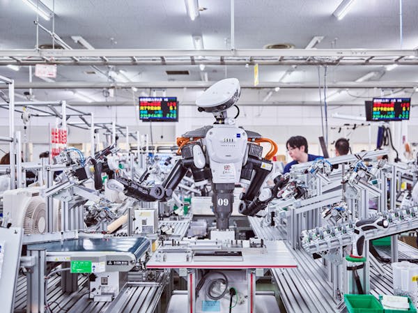 NEXTAGE Humanoid Robots on the Assembly Line At GLORY LTD / Kazo City / Japan / 2019