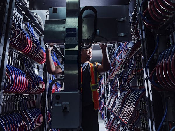 Technician Installing Compute Nodes into the El Capitan Supercomputer / Lawrence Livermore National Laboratory / Livermore / California / 2024