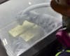 Gold Bars Being Cleaned After Casting / Cortez Gold Mine Refinery / Elko / Nevada / 2024