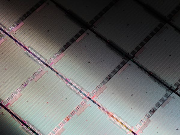 Trainium 2 Chip Dies on Wafer / AWS Facility / Austin / Texas / 2024