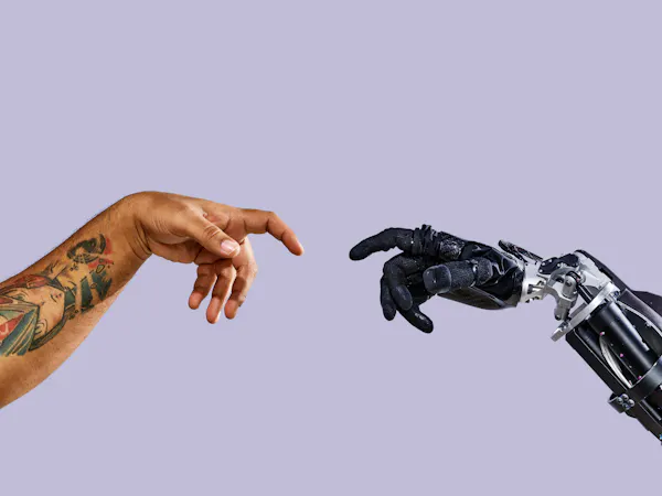 Human Hand and Apollo Humanoid Robot Hand / Apptronik / Austin / Texas / 2025