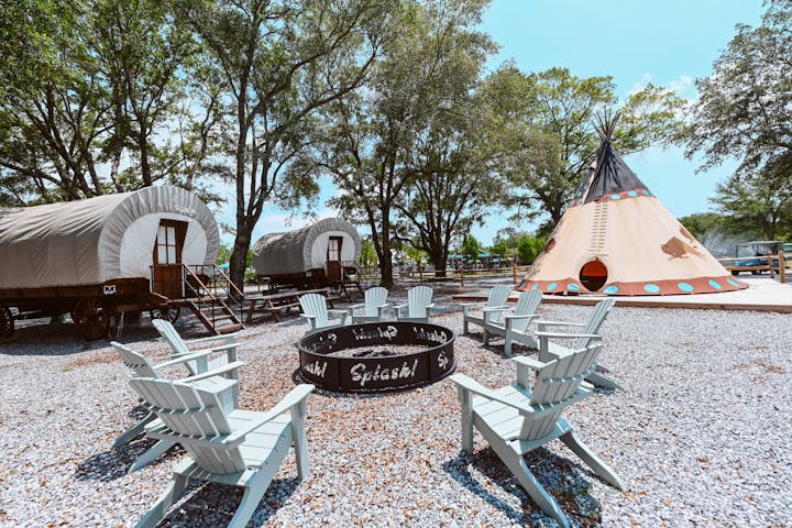Fire Pit in Center of Unique Accomadations at Splash RV Resort