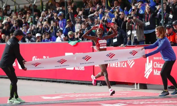 Brigid Kosgei crossing the marathon finish line