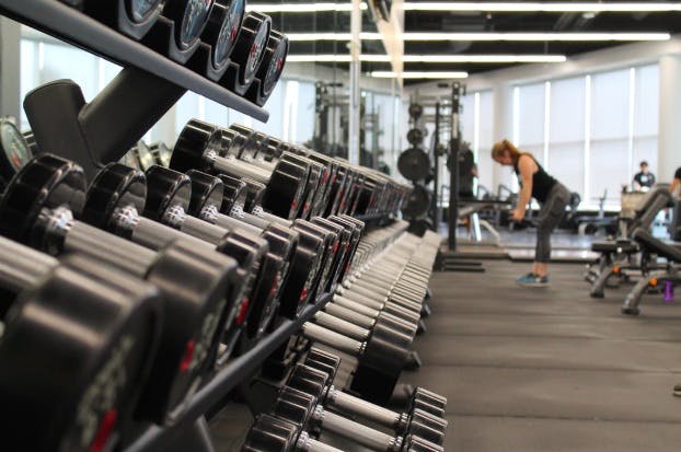 Blonde woman training at the gym