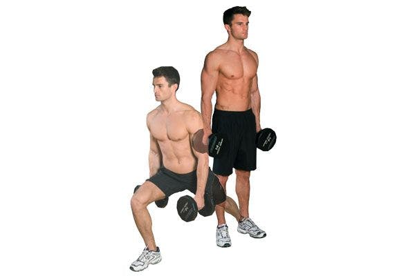 man performing transverse lunge with dumbbells