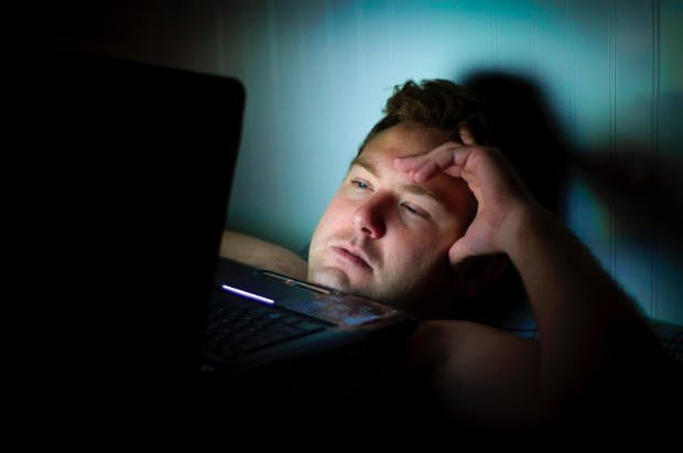 Staring at the laptop screen at night