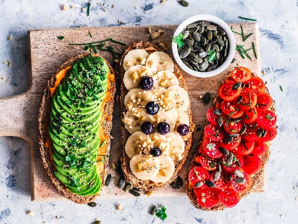 Sliced colorful vegetables on a wooden board