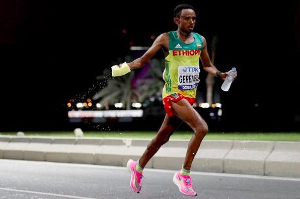 Mosinet Geremew wearing a T shirt with the Ethiopian flag